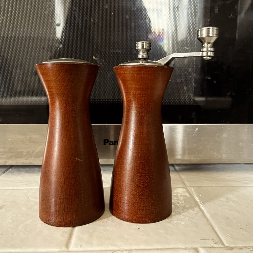 Vintage wooden salt shaker and pepper crank
